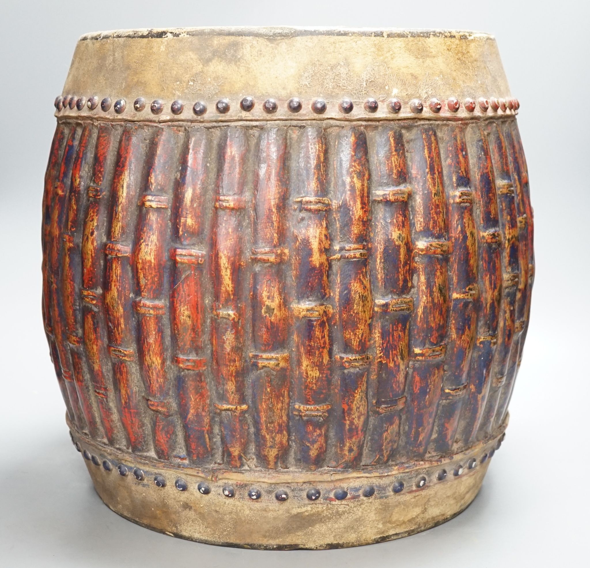 A Chinese bamboo-effect double sided temple drum, 37cm